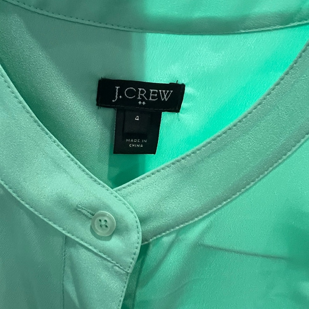 J. Crew. Women’s real, silk like material, button tank.